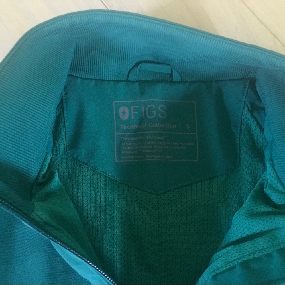 FIGS Sydney Scrub Jacket in a hunter green color - Picture 7 of 13